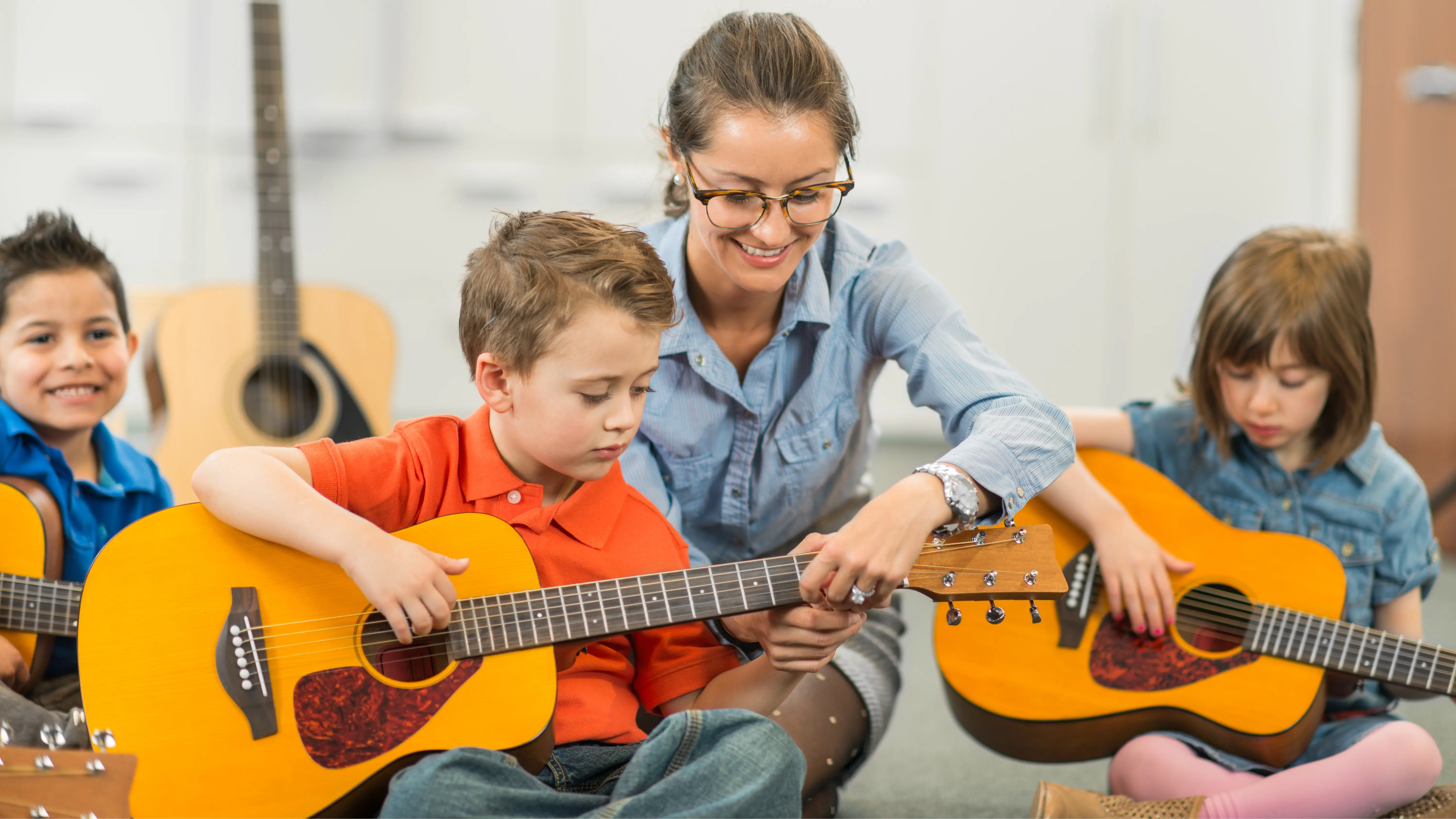 Guitar image for teacher and kid